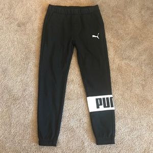 NWT PUMA joggers in black.